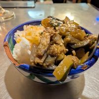 Delicious Asian eggplant with rice at La Goma in Granada