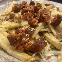 Patatas fritas con chorizo de Heura (bonus points por ponerle levadura nutricional!)  at Batoi Cafe Bar in San Vicente Del Raspeig
