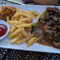 Vegan mushroom sausage with saurkraut and fries at The German Knodle in St Petersburg