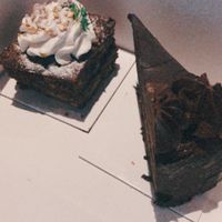 Vegan carrot cake (left) and chocolate cake (right) at Viola's Patisserie in Eindhoven