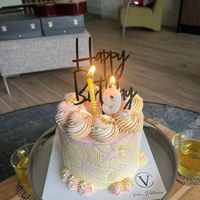 A pistachio-vanilla cake (≈60€).  at Viola's Patisserie in Eindhoven