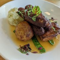Vegan Sunday roast dinner with vegan sausages at Beck Hall in Malham