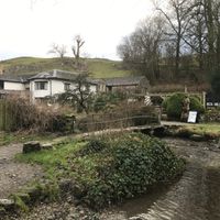 Grey start at Malham turning gorgeous. Check out the ford, and foot bridge to the left    at Beck Hall in Malham