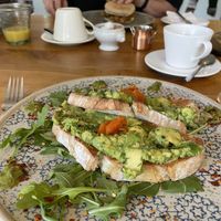 Avocado lox sourdough (with sausage & scrambled tofu bap in the background)  at Beck Hall in Malham