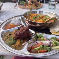 Indian Thali (banana blossom fish & chips in the background)  at Beck Hall in Malham