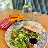 Avocado, tapenade and sundried tomato baguette with sweet potato wedges & salad and vinegar for my chips😄 at Beck Hall in Malham