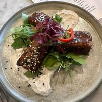 Tamarind treacle-glazed baby back 'ribs'
Handmade seitan, spiced crème fraiche, chive at Beck Hall in Malham