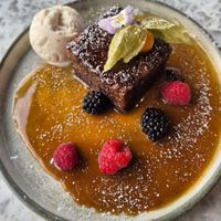 Sticky toffee pudding with creamy ice cream....wow! Yummo! 😋👍🌱 at Beck Hall in Malham