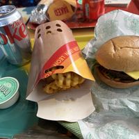 Vegan burger and large fries. Vegan aioli dip.   at LEON - Pancras Square in North London