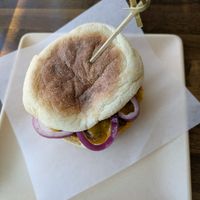Sausage, cheese, and onion on English muffin at Sunflower Bakehouse in Nashville