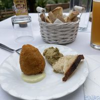 Hummus patty, rice with tomato and pees in deep fry  at Fattoria la Capra Campa in Acqui Terme