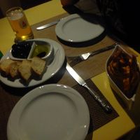 Olives and bread, humus and pita at Roussos Restaurant in Corfu