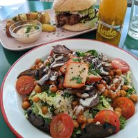 Ceasar salad and burger at Romero Verde in Madrid