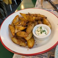 Spiced potatoes and homemade mayo at Romero Verde in Madrid