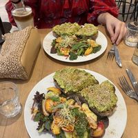 Avo toast and iced latte with oat milk.  at Virgule in Toulouse