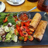 Caramelised onion shroomdogs, three salads and a chutney. The tea was delicious, mango. at Sage Cafe in Lancaster