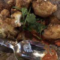 Curry cauliflower. Sauce underneath at Wildseed in San Francisco