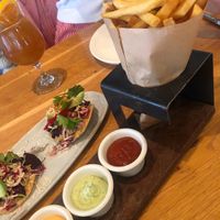 Bugle fries with flight of sauces  at Wildseed in San Francisco