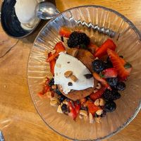 Citrus Almond Cake with Coconut 🥥 Cream and fresh berries at Wildseed in San Francisco