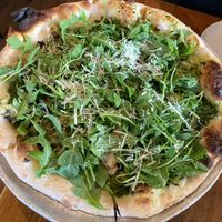 Green Forest pizza - chimichurri, broccolini, mushrooms, smoked cashew mozzarella, arugula at Wildseed in San Francisco
