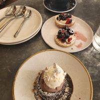 Lemon poppyseed cake with whipped cream and berries (top) and chocolate cake filled with mousse and topped with chocolate ice cream and whipped cream....both highly reccomended at Wildseed in San Francisco
