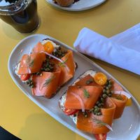 Delicious Carrot Lox toast w/ vegan cream cheese, capers, and dill on perfectly toasted whole wheat bread.  at Wildseed in San Francisco