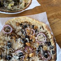 Onions and olives with regular dough and vegan meat.  at Mod Pizza in Kalispell