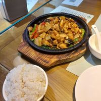 Vegetarian three cup chicken on a sizzling plate at Jing Lian Zhai - Hepingli in Beijing