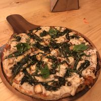 Pizza spinach and tofu and loads of cheese at Ubuntu Eat in Kolkata