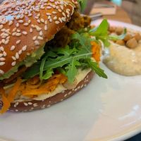 Vegan chicken burger with hummus and avocado at Nude Food in Augsburg