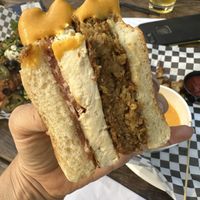 House made “sausage” patty, tofu “egg” round and vegan bacon!   at Lively Up Yourself - Food Truck in Bend