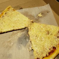 Vegan cheese pizza. Apologies - the color looks off because of my kitchen light. This pizza was really good! at Leone's Pizzeria in Elmwood Park
