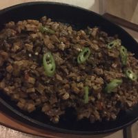 Delicious Filipino dish served with rice at The Cavern in El Nido