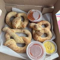 Half order of vegan pretzels with mustard. And 2 sides of tomato sauce.  at Mellow Mushroom in Branson