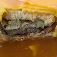 Layers of francesinha at Prema in Viseu