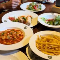 The fries, salad, wraps, grilled veggies and the gnocchi. (We ordered all the vegan options)  at Forst Bräustüberl in Lagundo