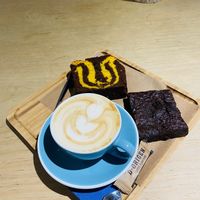 Coffee w/ soy milk , orange cake and chocolate brownie, 100% vegan . All for € 8.50  at Rogel in Valencia