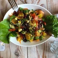 Salad with cranberrries and cashews at VegaRoom in Lviv