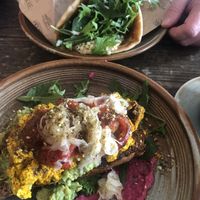 Scrambled tofu, avo’ and beetroot hummus - delicious. Slouvaku in the background with falafel.   at Beach House Cafe in Kaikoura