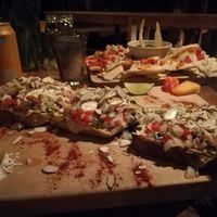 Hummus toast, nachos at Eagle's Nest Atitlan in San Marcos La Laguna