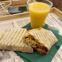 Wrap joyful seitan with homemade Mango lassi   at Oaza Joyful Kitchen in Zagreb
