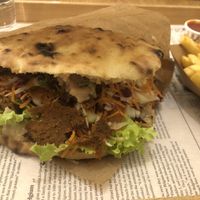 A wrap and fries that did their job nicely   at Oaza Joyful Kitchen in Zagreb