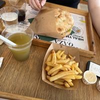 Kebab and fries combo with immune boost juice  at Oaza Joyful Kitchen in Zagreb