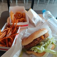 Crispy Supreme Buffalo Burger, onion rings and sweet potato fries at MAX - Jana Pawła in Warsaw