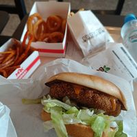 Crispy Supreme Buffalo Burger, onion rings and sweet potato fries at MAX - Jana Pawła in Warsaw