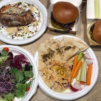 Burger, salad, stuffed sweet potatoe and Hummus for take away at Can Nuts in Ibiza