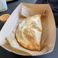 Portobello mushroom empanada with awesome sauce!! at Que Gusto in Tulsa