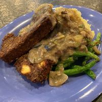 
Lentil mushroom “meatloaf” with mushroom gravy, garlic mashed potatoes and green beans. at The Root Cellar in Pittsboro