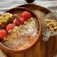 Pink smoothie bowl with granola  at Two Little Birds in Luang Prabang