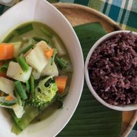 Green curry & purple rice at Two Little Birds in Luang Prabang